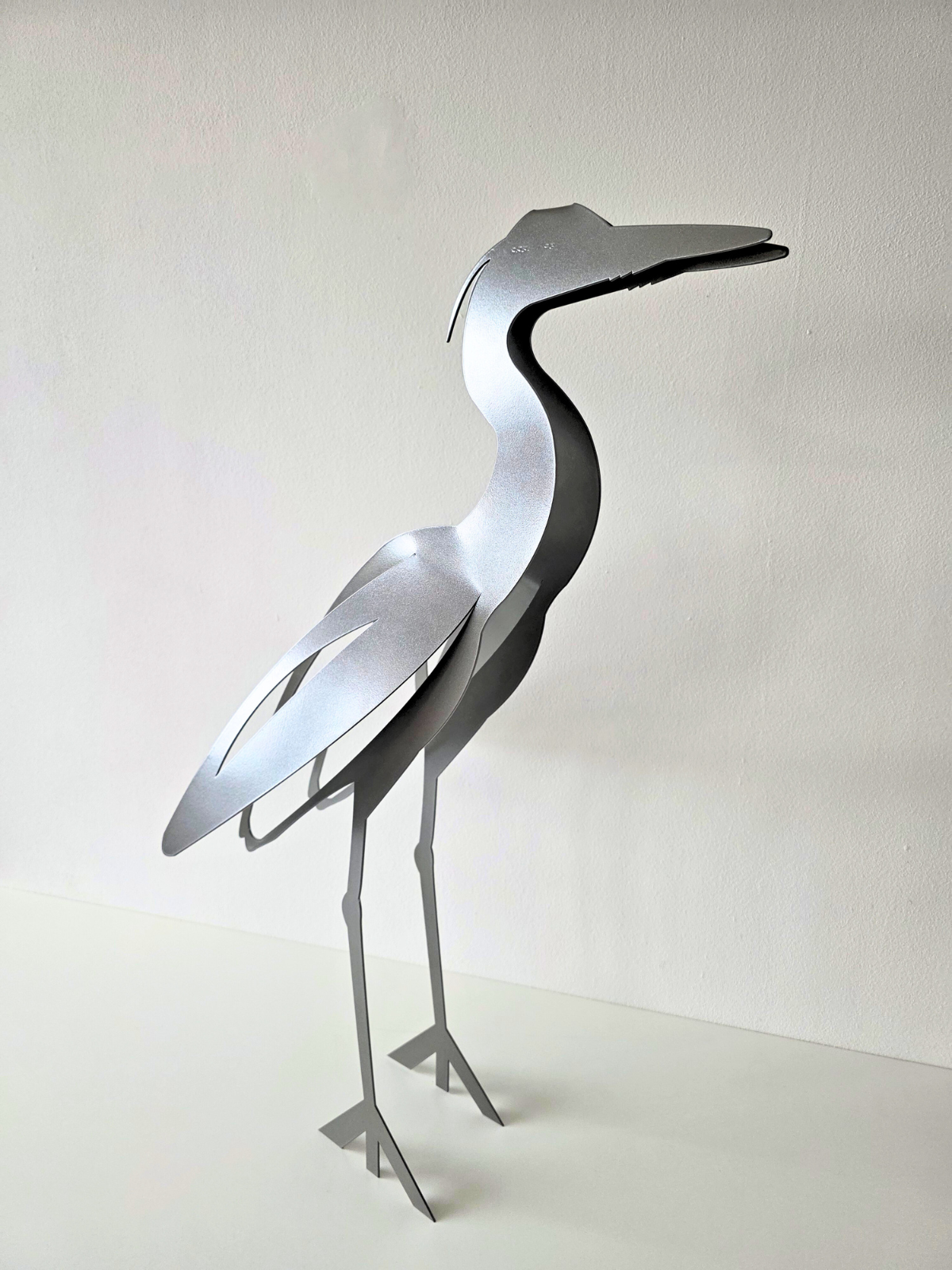 Dekoracyjna czapla do postawienia w ogrodzie